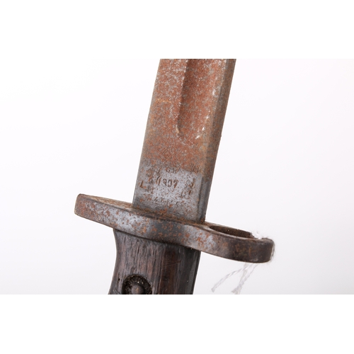 32 - An assortment of 20th century militaria. Comprising morse code tappers, a cut bayonet in a leather s... 