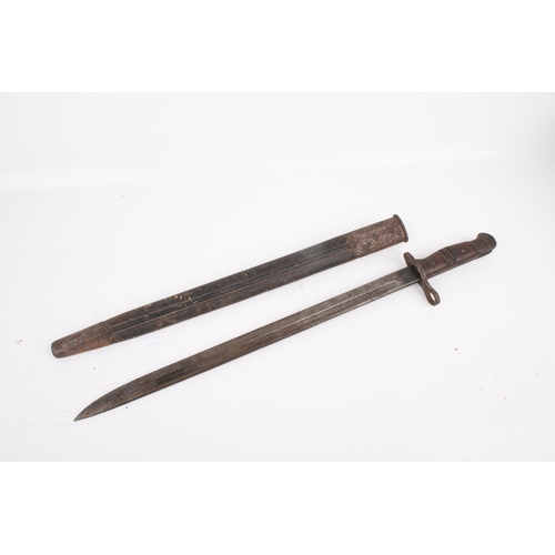 45 - A WWI Remington 1913 pattern bayonet. Marked 6/17, with a wooden handle, in a scabbard, L57.5cm