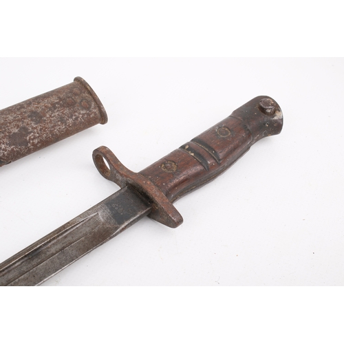 45 - A WWI Remington 1913 pattern bayonet. Marked 6/17, with a wooden handle, in a scabbard, L57.5cm
