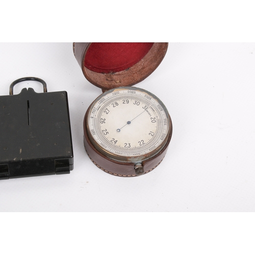 51 - Three 20th century military collectables. Comprising a pair of WWII Millitary Police handcuffs, date... 
