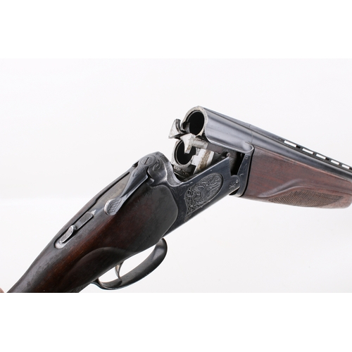 Baikal 12 bore over and under shotgun. S/n P06334, quarter and three ...