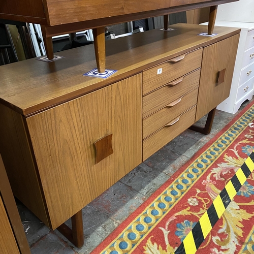 12 - Europa four drawer sideboard in teak