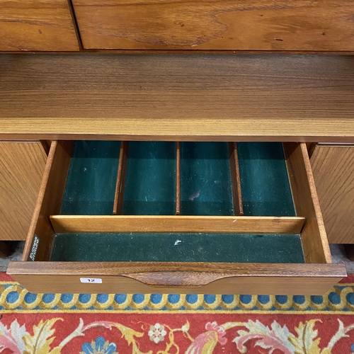 12 - Europa four drawer sideboard in teak