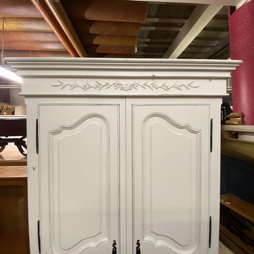 81 - White double wardrobe with ornate carvings on top with metal handles with keys