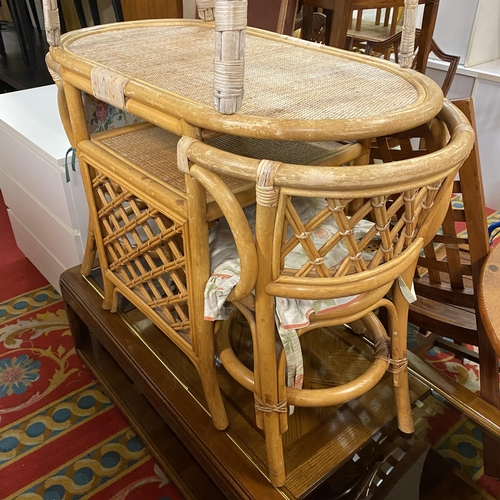 89 - Bamboo table with two matching bamboo and bergere chairs