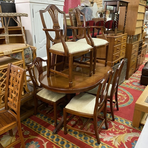 92 - Double pedestal mahogany D end dining table on lions paw feet and castors with four wheat sheaf dine... 