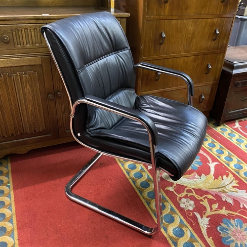 17 - Black leather and chrome executive board room chair