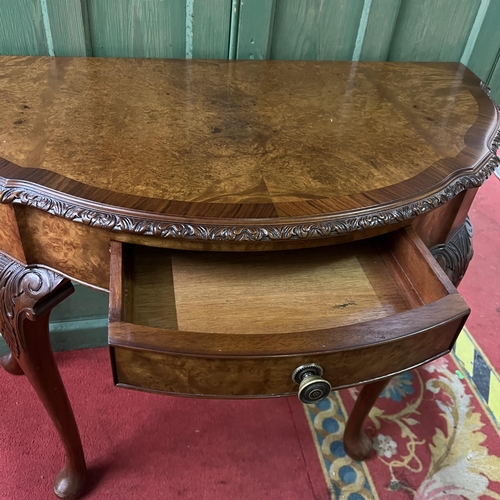 17 - Walnut and mahogany half moon console table with single drawer front on Queen Anne legs