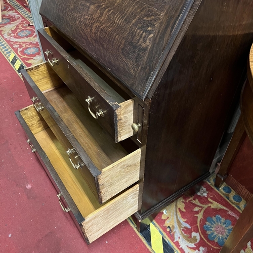 19 - Oak fold front bureau with brass handles