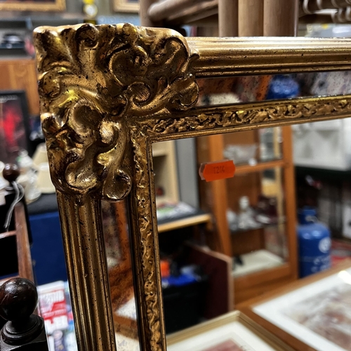 254 - Large gilt framed mirror with mirrored border