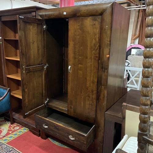 31 - Solid oak double door wardrobe with double drawer bottom