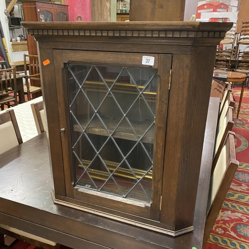 37 - Oak wall hanging corner cabinet