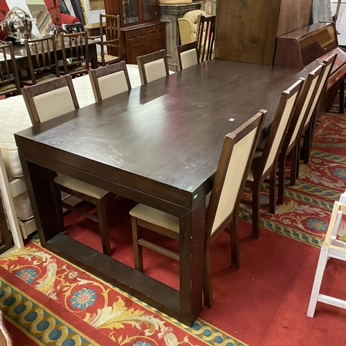 38 - Solid oak contemporary dining table with eight cream leather dining chairs