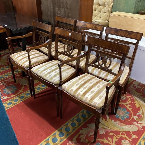 42 - Set of four regency stripe dining chairs and two matching carvers on turn legs