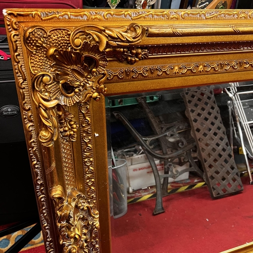 449 - Very large brand new ornate gilt mirror with bevelled glass - 6x3.3ft