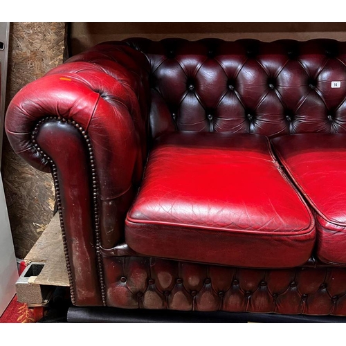 14 - Three seater Chesterfield settee in ox blood red leather