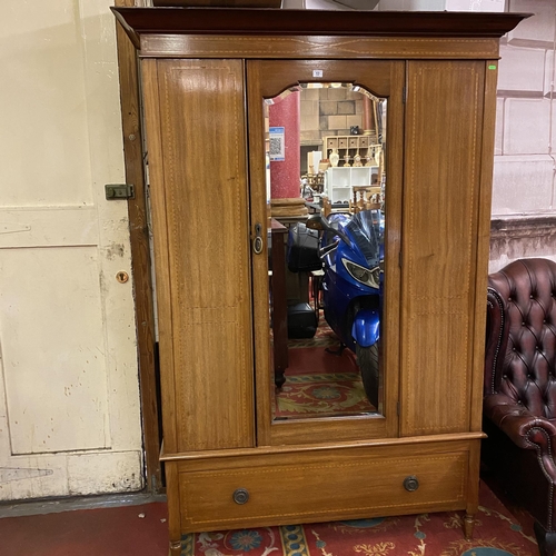 17 - Edwardian mahogany mirrored door wardrobe on single drawer base with cross banding inlay and bevelle... 