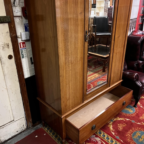 17 - Edwardian mahogany mirrored door wardrobe on single drawer base with cross banding inlay and bevelle... 