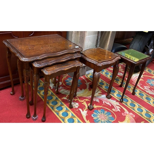 18 - Mahogany heavily carved nest of three tables with glass tops - with two other carved and glass top t... 