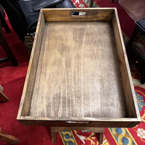 24 - Harrods serving tray on stand in pine with metal corners on fold away stand