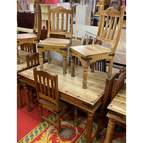 26 - Rustic table and six chairs with wrought iron corners and studded top