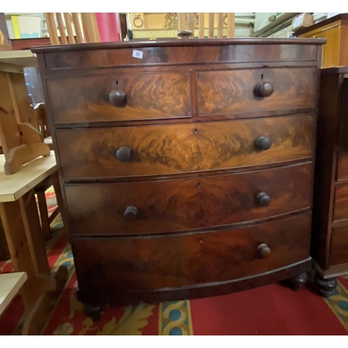 36 - Victorian bow fronted two over three chest in mahogany