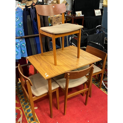 41 - 1970’s teak dining table with four teak dining chairs