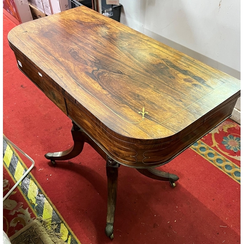 116 - Victorian rosewood fold over games table with brass inlay on splay legs and brass castors