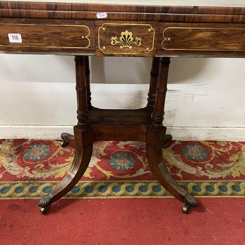 116 - Victorian rosewood fold over games table with brass inlay on splay legs and brass castors