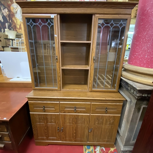 57 - Oak display cabinet