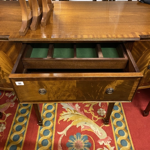 86 - Flamed mahogany sideboard on tapered legs