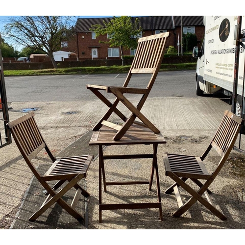 1 - Teak folding garden table and three chairs