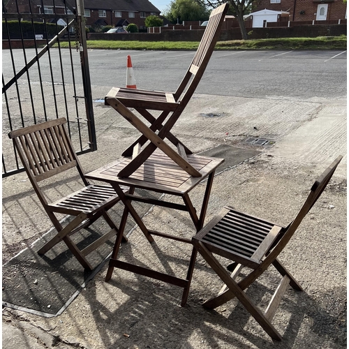 1 - Teak folding garden table and three chairs