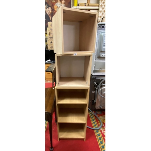 56 - Two pigeon holes and three tier shelving