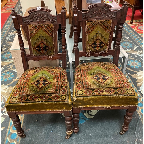 58 - Pair of Edwardian carpet chairs on castors