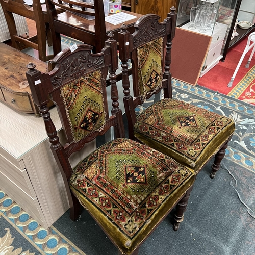 58 - Pair of Edwardian carpet chairs on castors