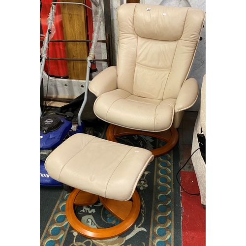 82 - Cream leather reclining armchair with matching footstool