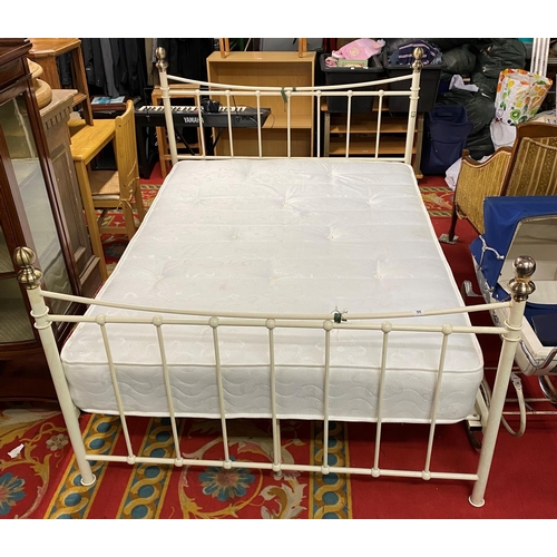 99 - Wrought iron double bed complete with mattress