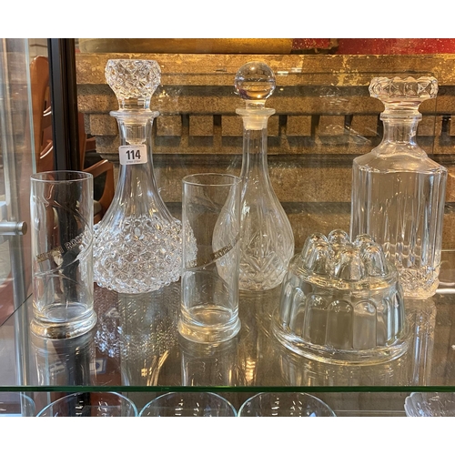 114 - Selection of crystal glassware including various decanters, jelly mould and two glasses