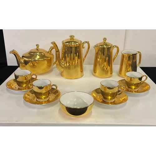 155 - Royal Worcester “Flameproof “ 24ct gold plated tea/coffee service. Circa 1950s