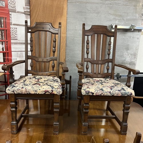 19 - Mahogany extending D ender table with six oak diners, two matching carvers and three extending leafs