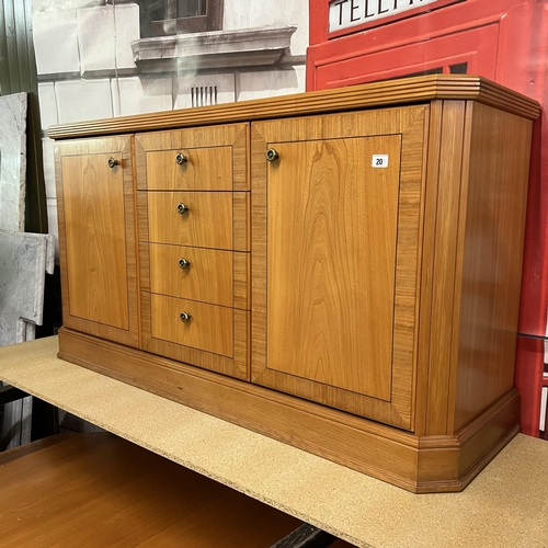 20 - Teak dining room suite comprising of sideboard,  extending dining table and four chairs