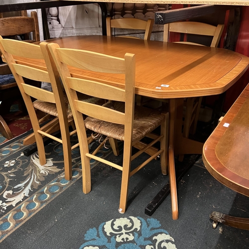 20 - Teak dining room suite comprising of sideboard,  extending dining table and four chairs