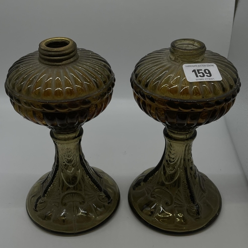 159 - Pair of early oil lamp fonts