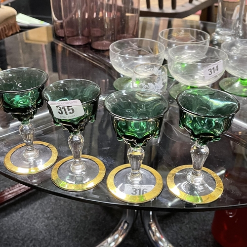 315 - Set of four green and gold crystal glasses