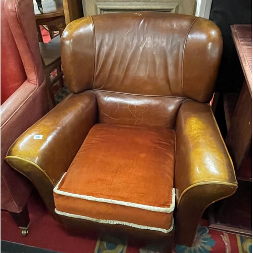 66 - Leather low armchair