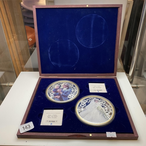 143 - Two Princess Diana memorial coins with authenticity certificate