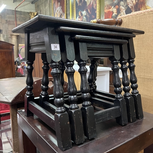 34 - Solid darl oak nest of three tables