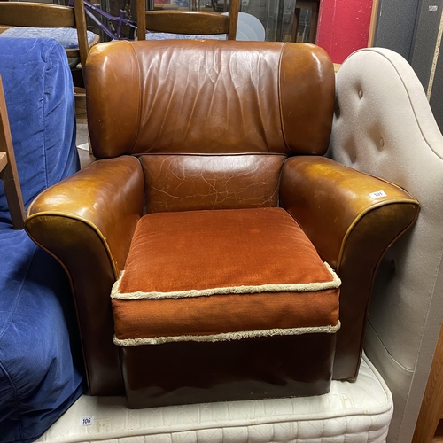 101 - Leather low armchair