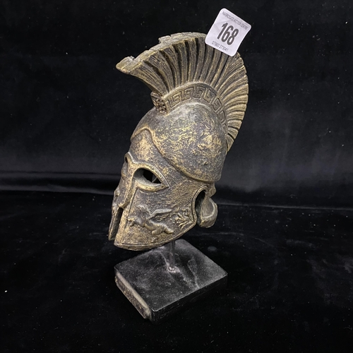 168 - Ancient greek helmet on stand